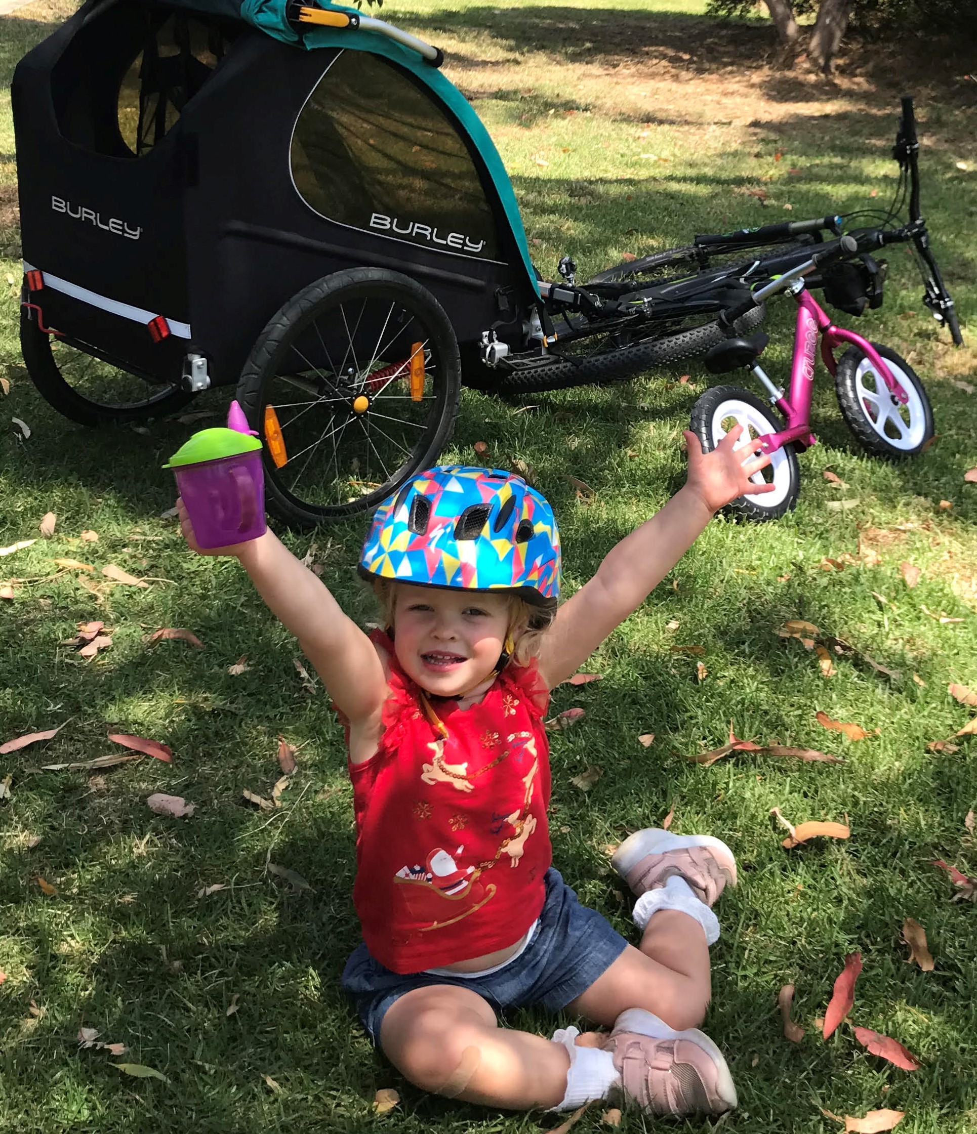 What are the benefits of learning to ride a balance bike?